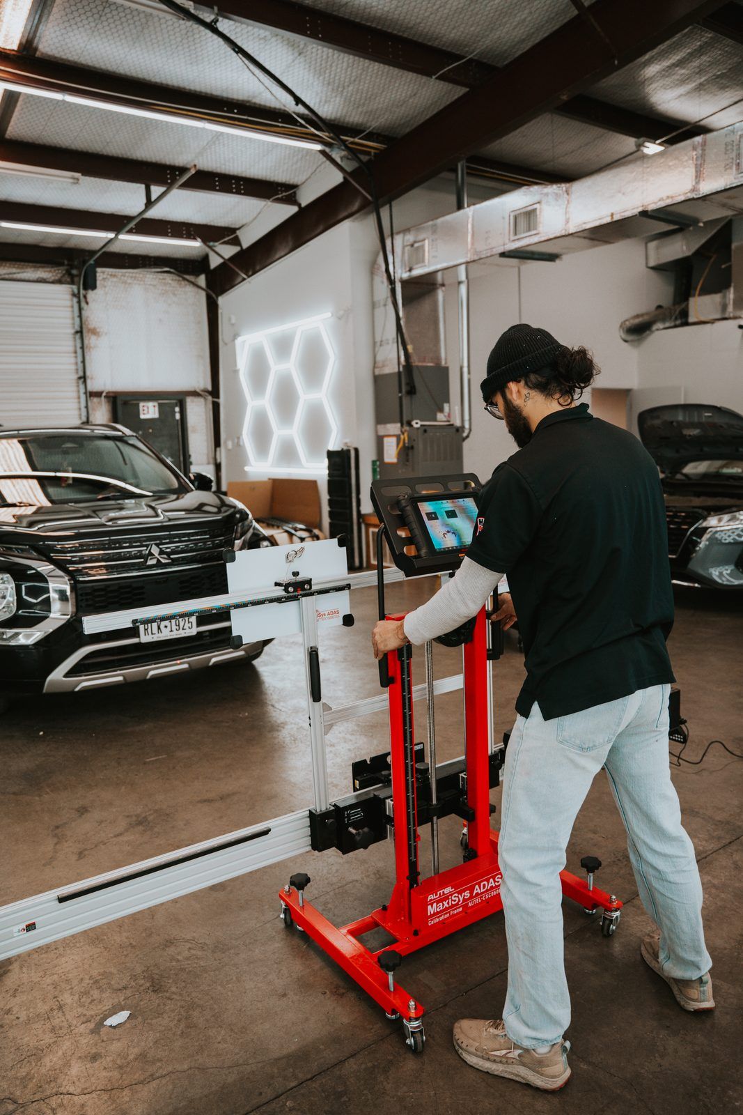 In-house ADAS calibration rig at Hail Repair Pro Lubbock