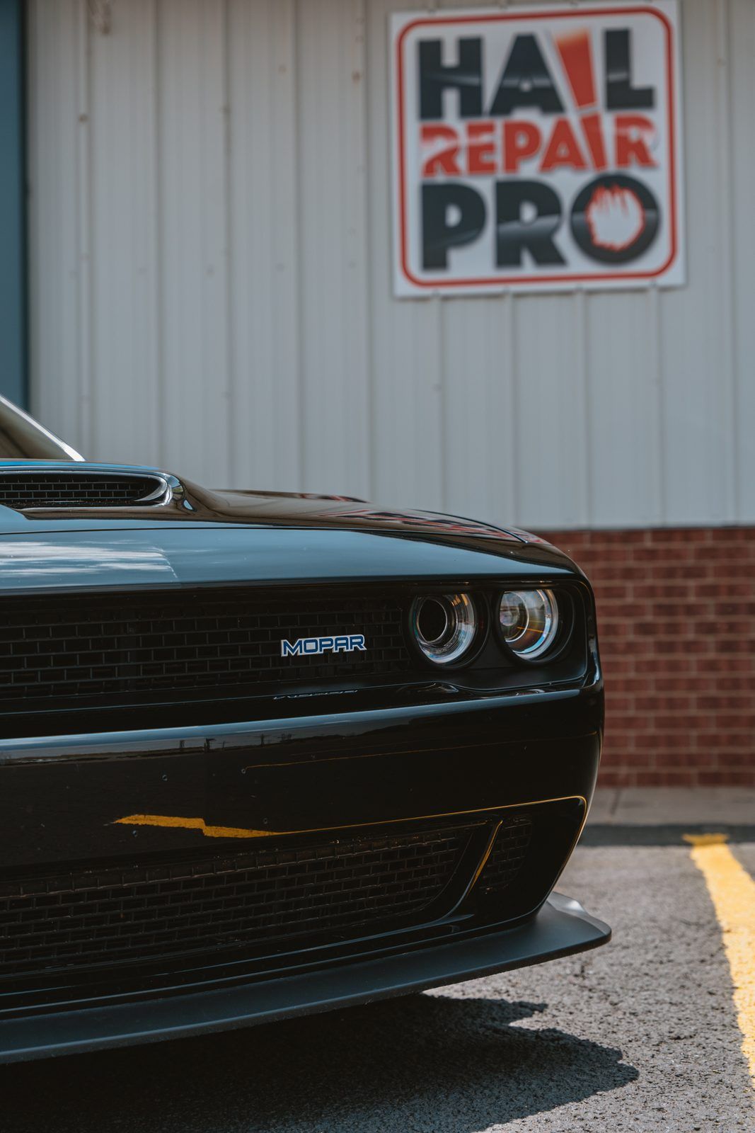 Challenger in the Hail Repair Pro Lubbock bay